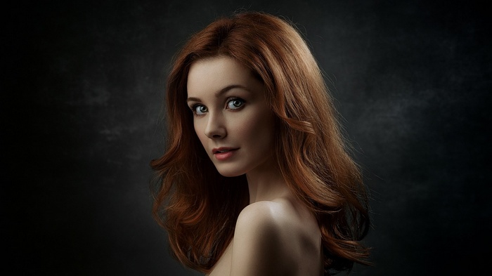 Portrait of a redhead woman with green eyes