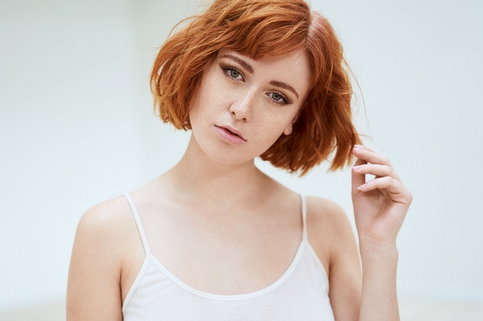 Portrait of a redhead woman with freckles