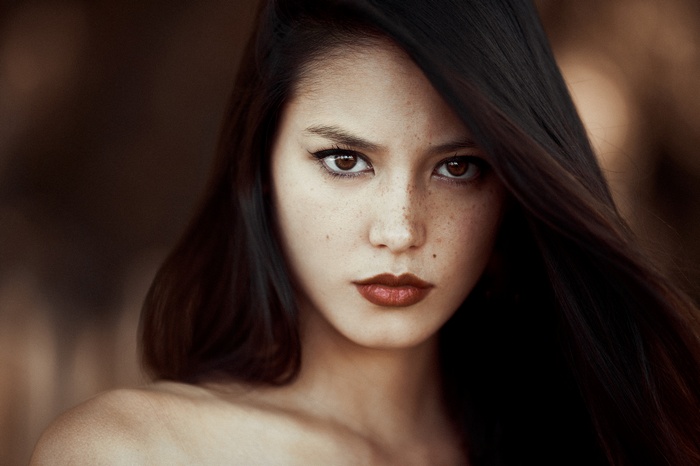 Portrait of a woman with freckles