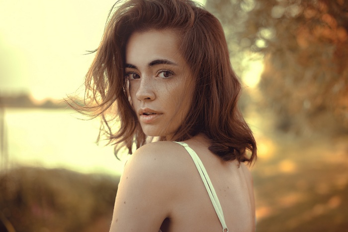Portrait of Lidia Savoderova with freckles