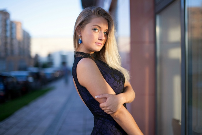 Woman in a black dress outdoors