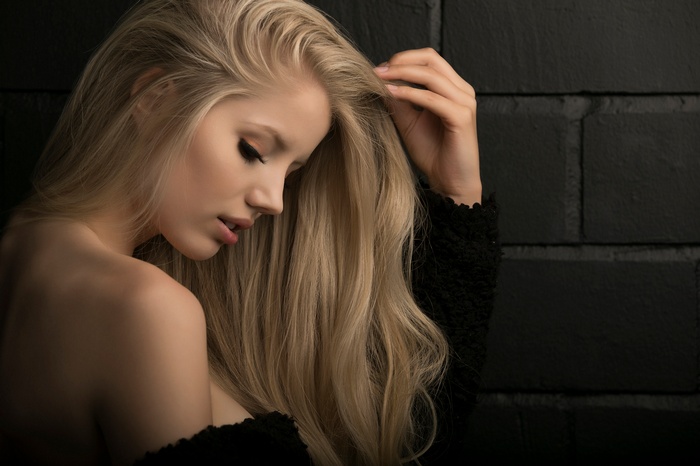 Portrait of a blonde woman in profile