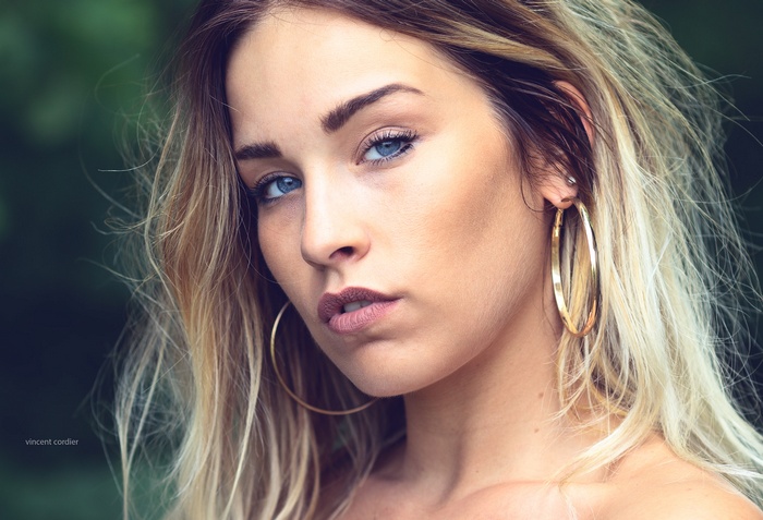 Woman with blonde hair and blue eyes