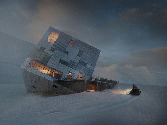 Modern cube building in a snowy landscape with a snowmobile