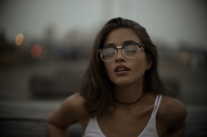 Woman with glasses and choker