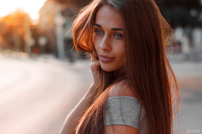 Portrait of a woman with blue eyes outdoors
