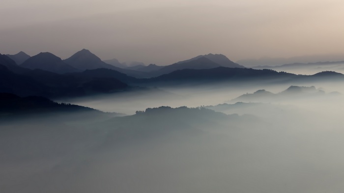 Misty mountains at sunrise