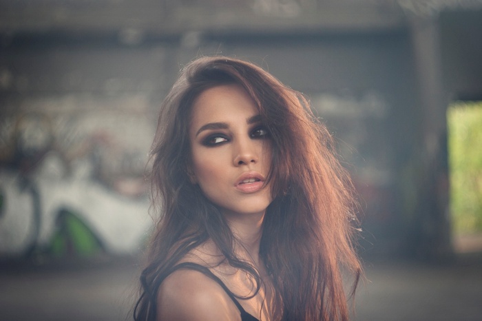 Woman with smoky eyes looking away