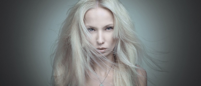 Portrait of a blonde woman with windblown hair