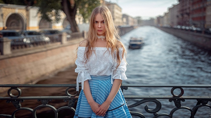 hair in face, bridge, bokeh, face, river, blonde, blue eyes, bare shoulders, skirt, white shirt, women, Georgy Chernyadyev, Maria Kudryavtseva, women outdoors, no bra, choker