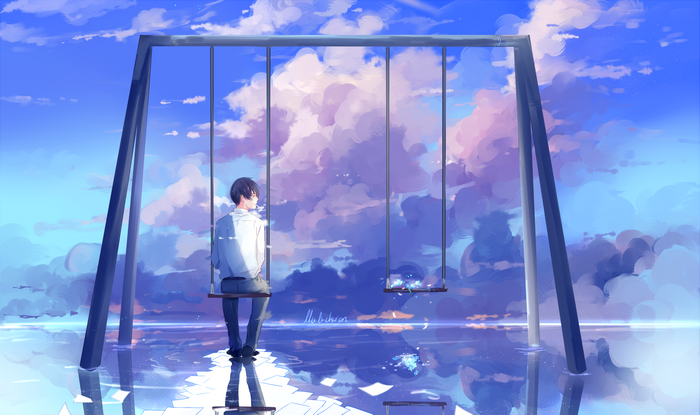 Boy on a swing over reflective water with clouds