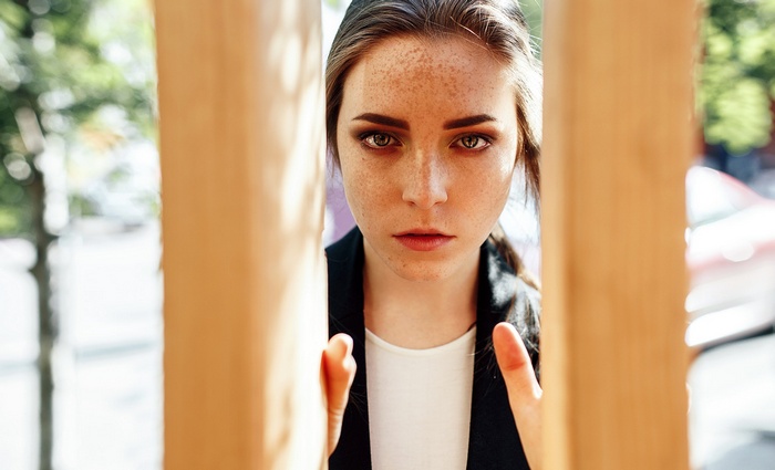 Anastasia Lis with freckles looking at viewer