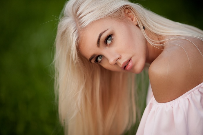 Woman with blonde hair outdoors