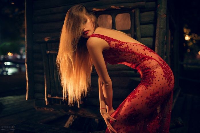 Woman in a red dress by Ivan Gorokhov