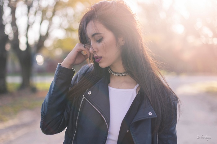 Candela Fischer wearing a leather jacket outdoors