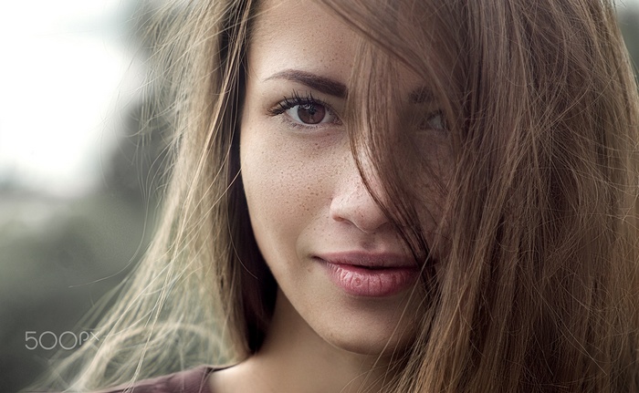 Woman with freckles and brown hair, Alina Batrak