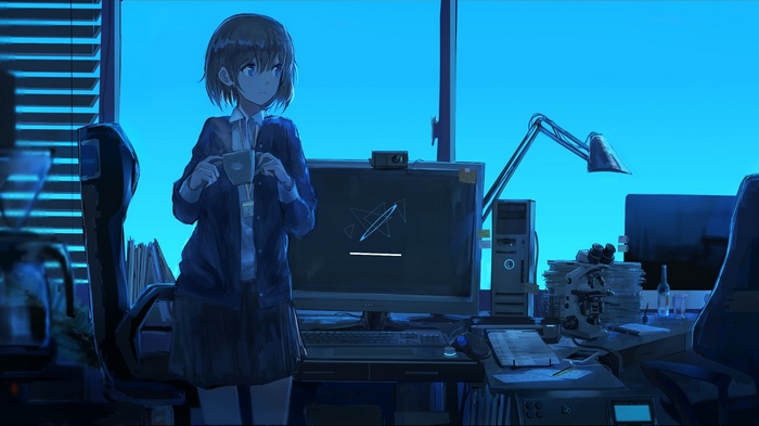Girl with cup in office with computer and lamp