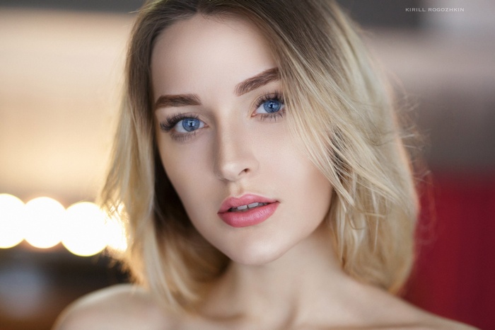 Portrait of a blonde woman with blue eyes