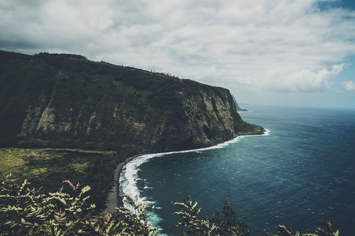 Coastal cliffs and ocean waves in Hawaii