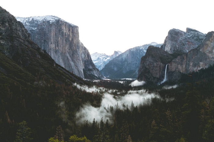 Yosemite National Park mountains with mist and waterfall