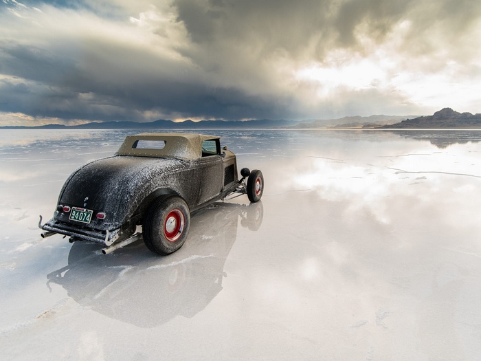Hot Rod on a Salt Flat with Dramatic Clouds
