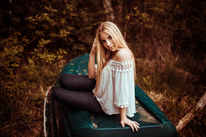 Woman sitting in a boat