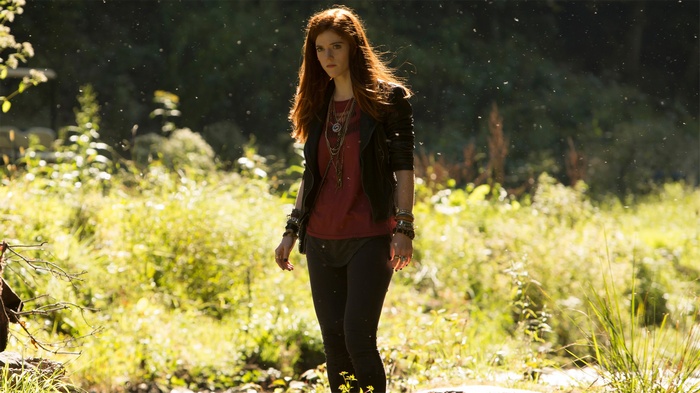 Rose Leslie in a forest