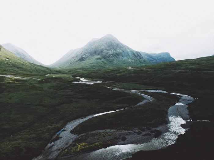 Misty mountains and winding river valley