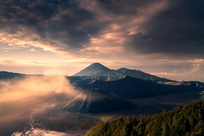 Mount Bromo volcano landscape at sunrise with mist