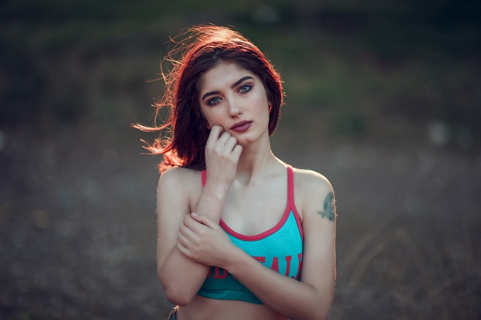 Woman with tattoo outdoors