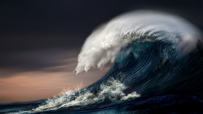 Massive wave crashing in the ocean