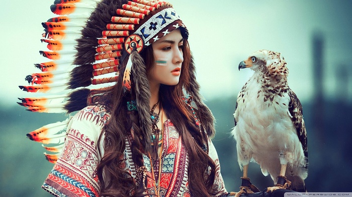 Woman in Native American Headdress with Eagle