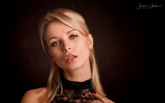 Woman with blonde hair and blue eyes