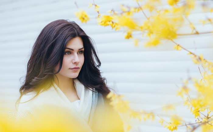 Portrait of a young woman with dark hair