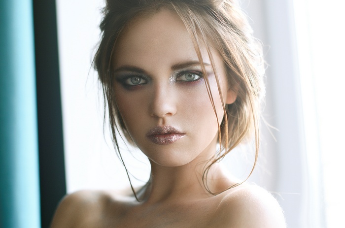 Portrait of a woman with dramatic makeup