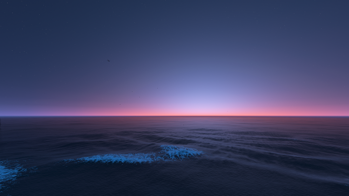 Ocean waves under a starry twilight sky
