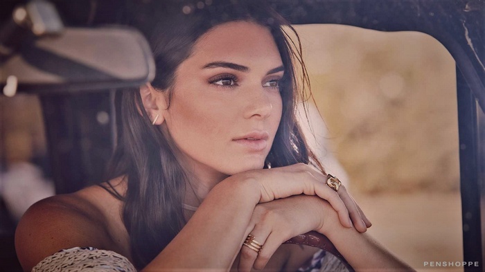 Kendall Jenner in a car looking into the distance