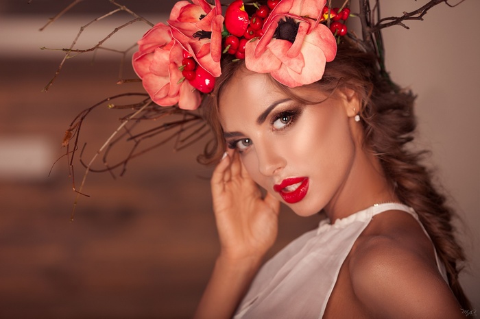 Woman with flower crown and red lipstick
