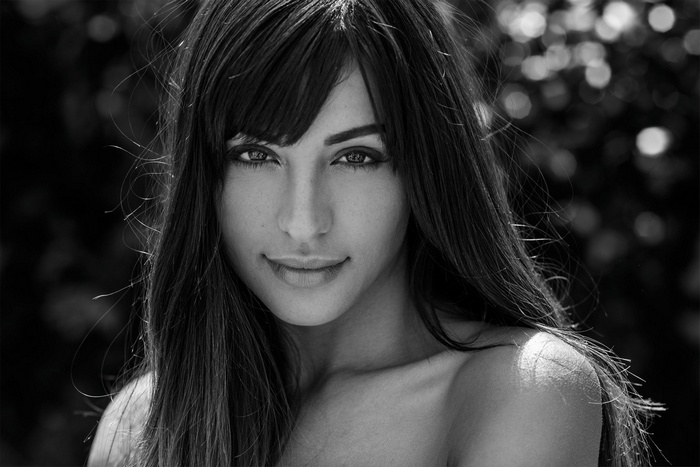 Monochrome portrait of a woman with bare shoulders
