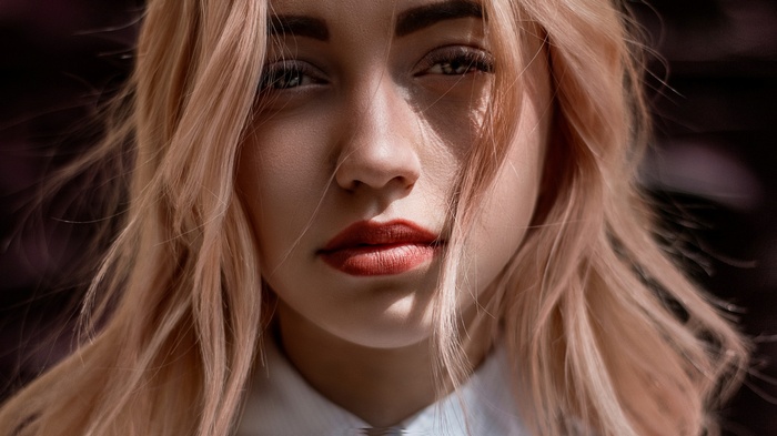 Close-up portrait of a blonde woman