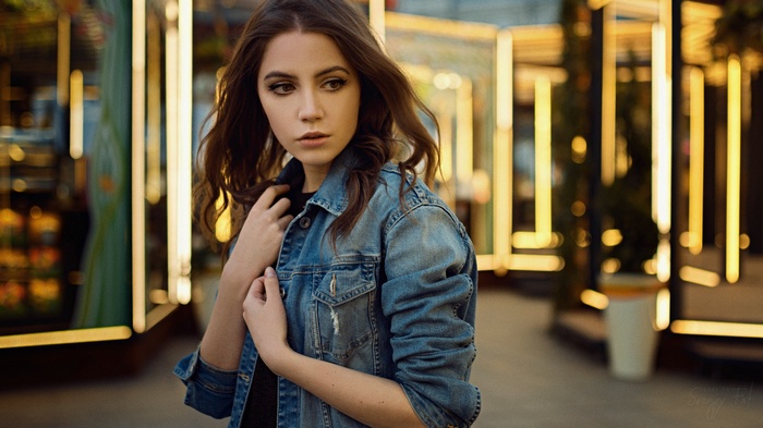 Ksenia Kokoreva in a denim jacket