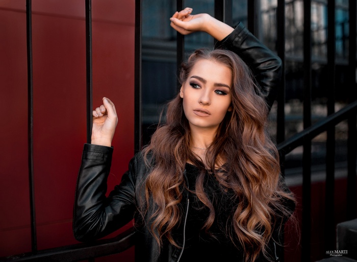 Aleksandra Taranova in a leather jacket outdoors