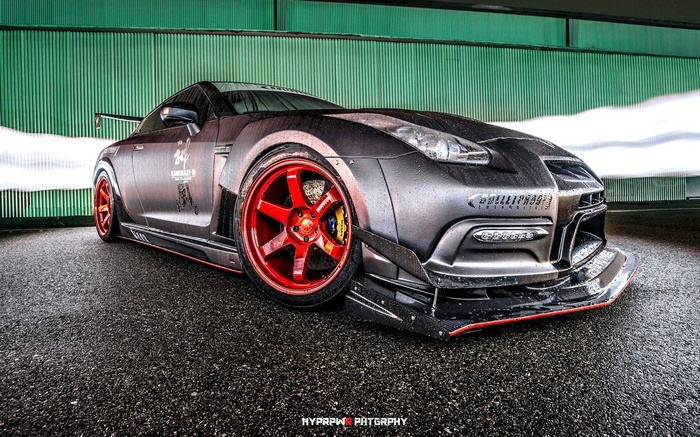 Modified Nissan GTR with red wheels