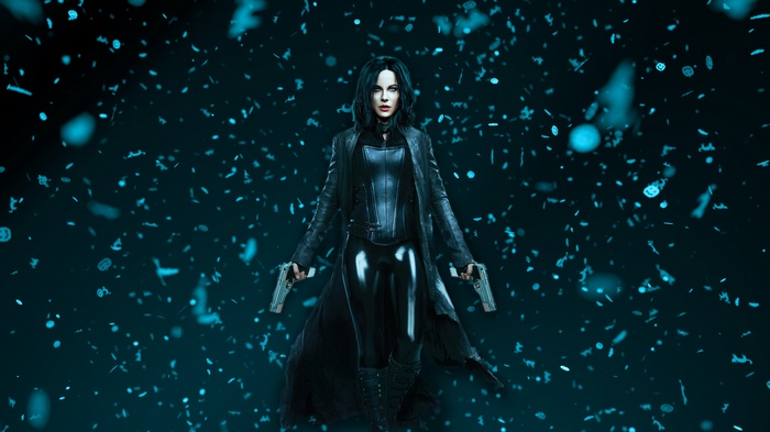 Selene from Underworld holding two guns