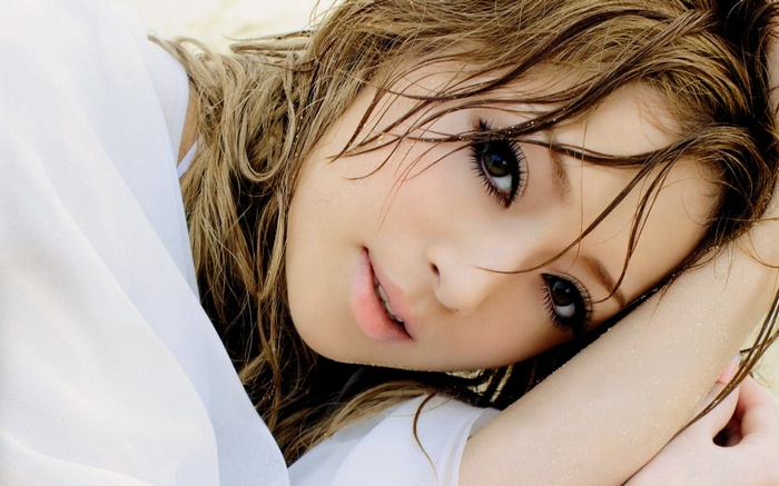 Ayumi Hamasaki with wet hair and white clothing