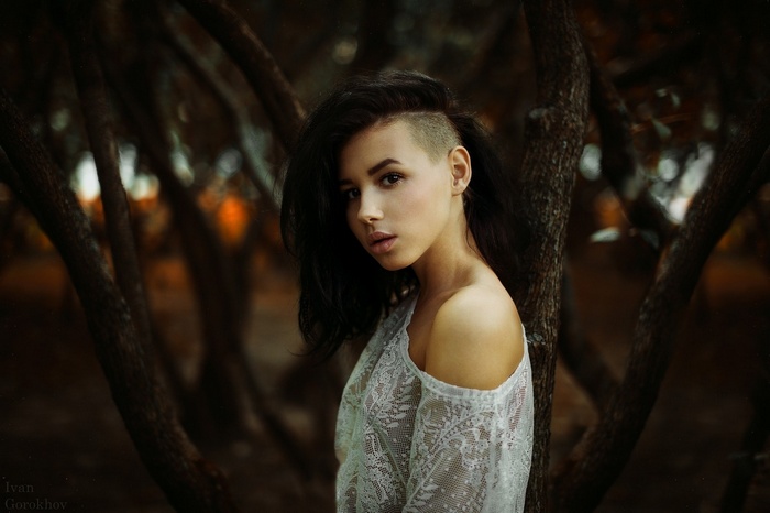 Portrait of a woman with shaved sideburns