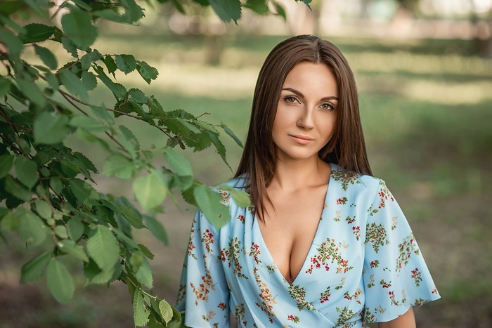 Woman in a floral dress outdoors