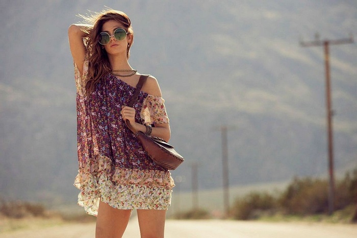 Carmella Rose in a floral dress with sunglasses