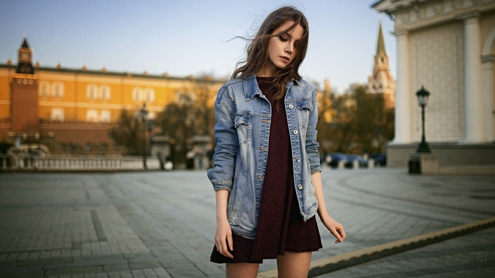 Woman in denim jacket and dress in Moscow