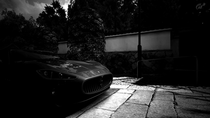 Maserati car on a stone-paved street